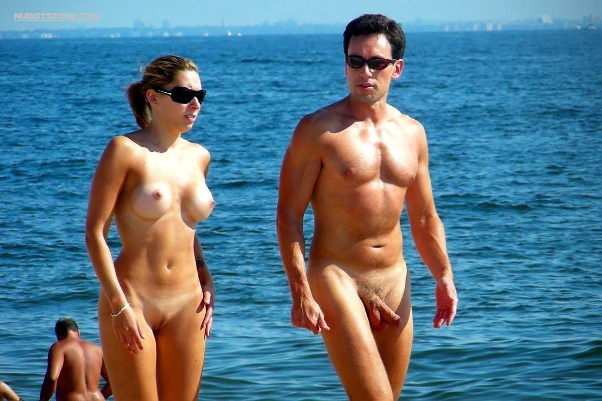 Naked family in the beach